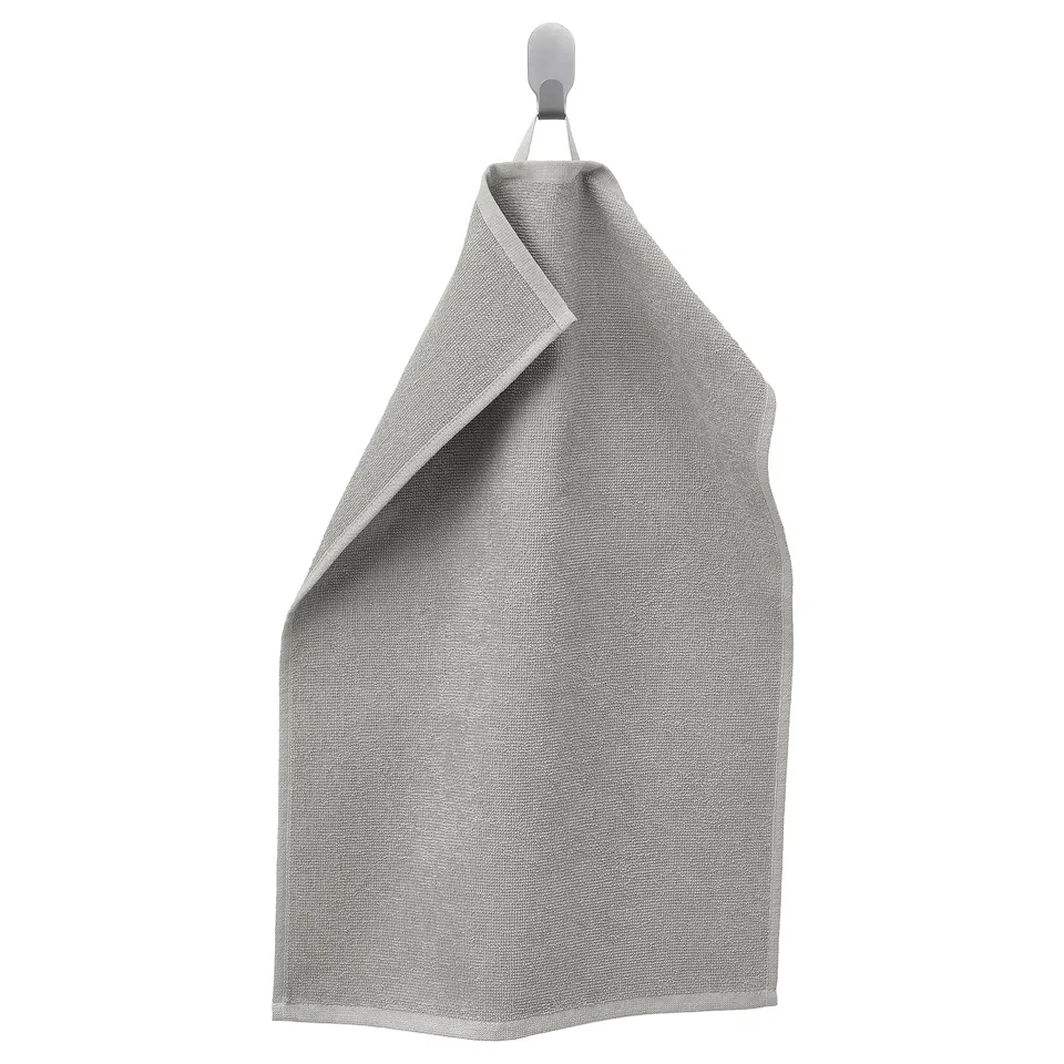Grey ludvial cotton towel on hook, textured, soft