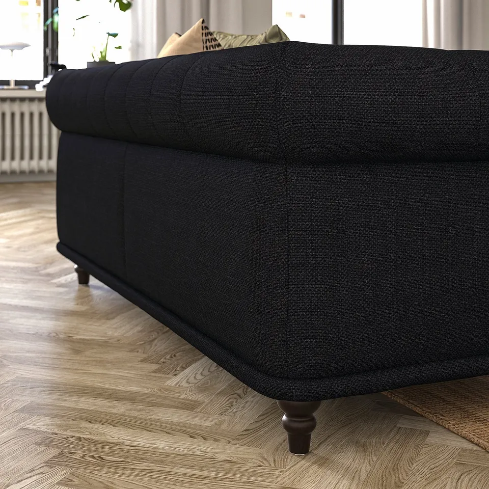 A VISKAFORS sofa. Black tone, classic design, soft shape, wooden legs.