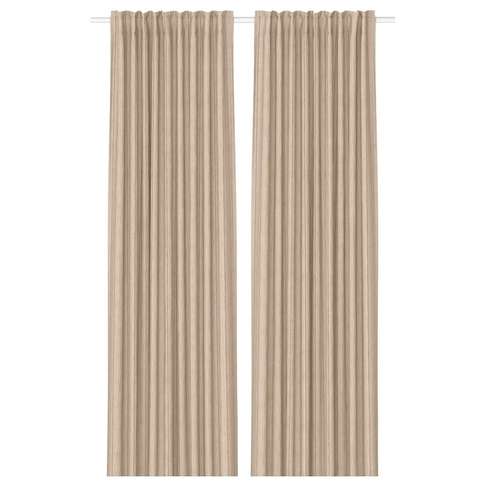 Two beige MAISTANGG curtains hang side by side, featuring a jute and cotton blend with vertical stripes and woven dots for added texture.