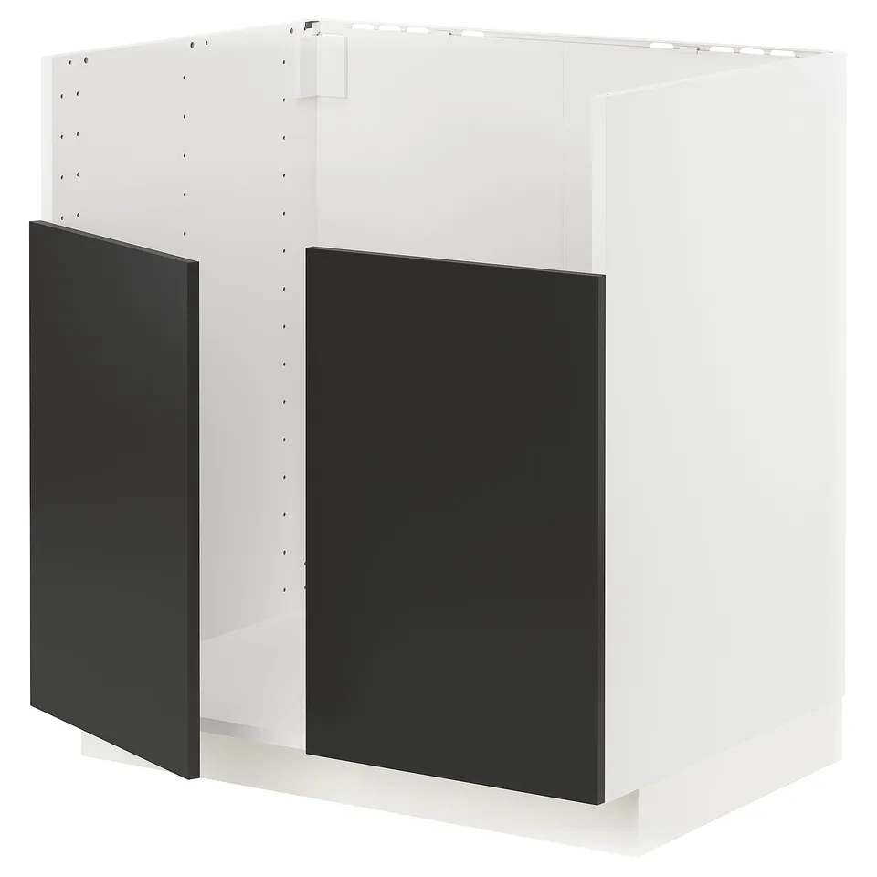 A white and black METOD kitchen unit, rectangular in shape, featuring modern design with sleek lines and matte black doors.