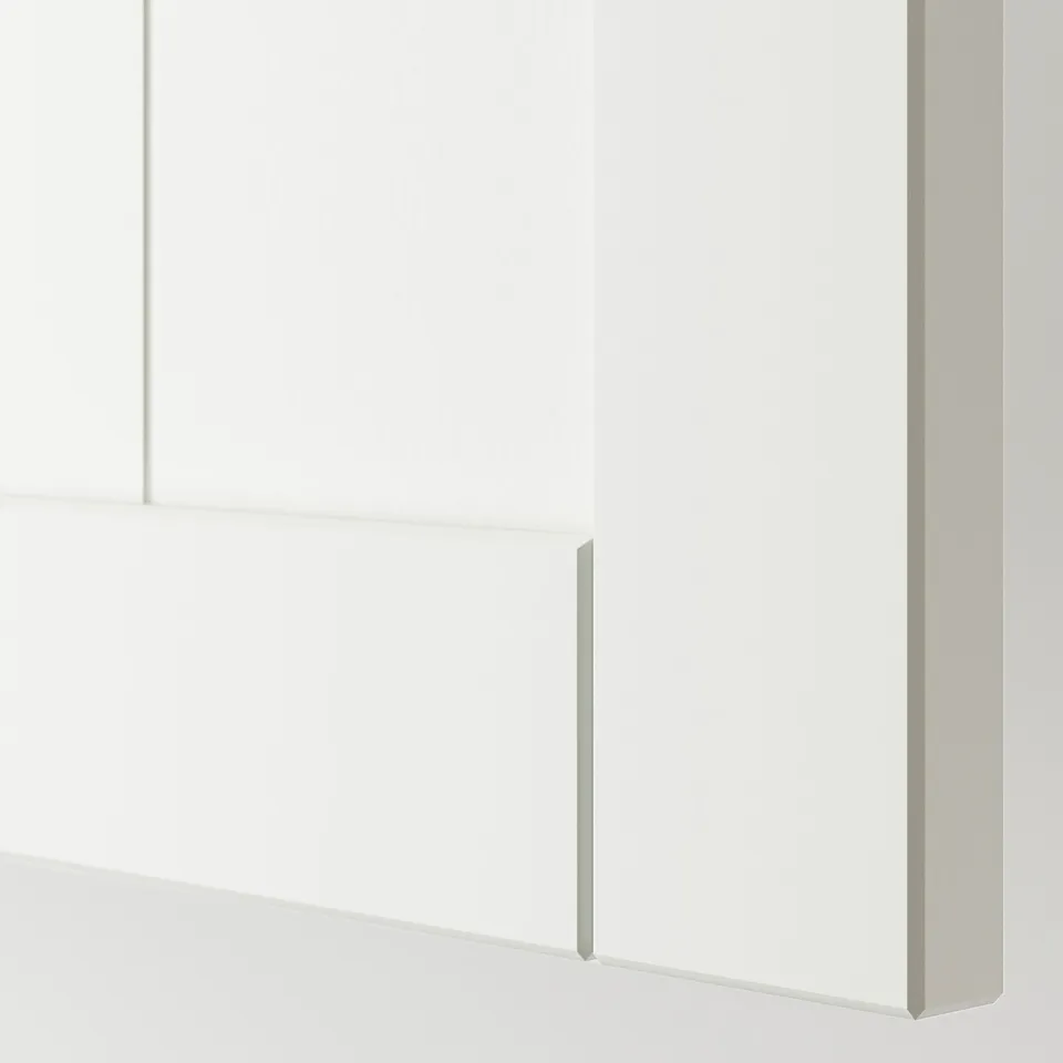 Modern white cabinet with sleek design and clean lines.