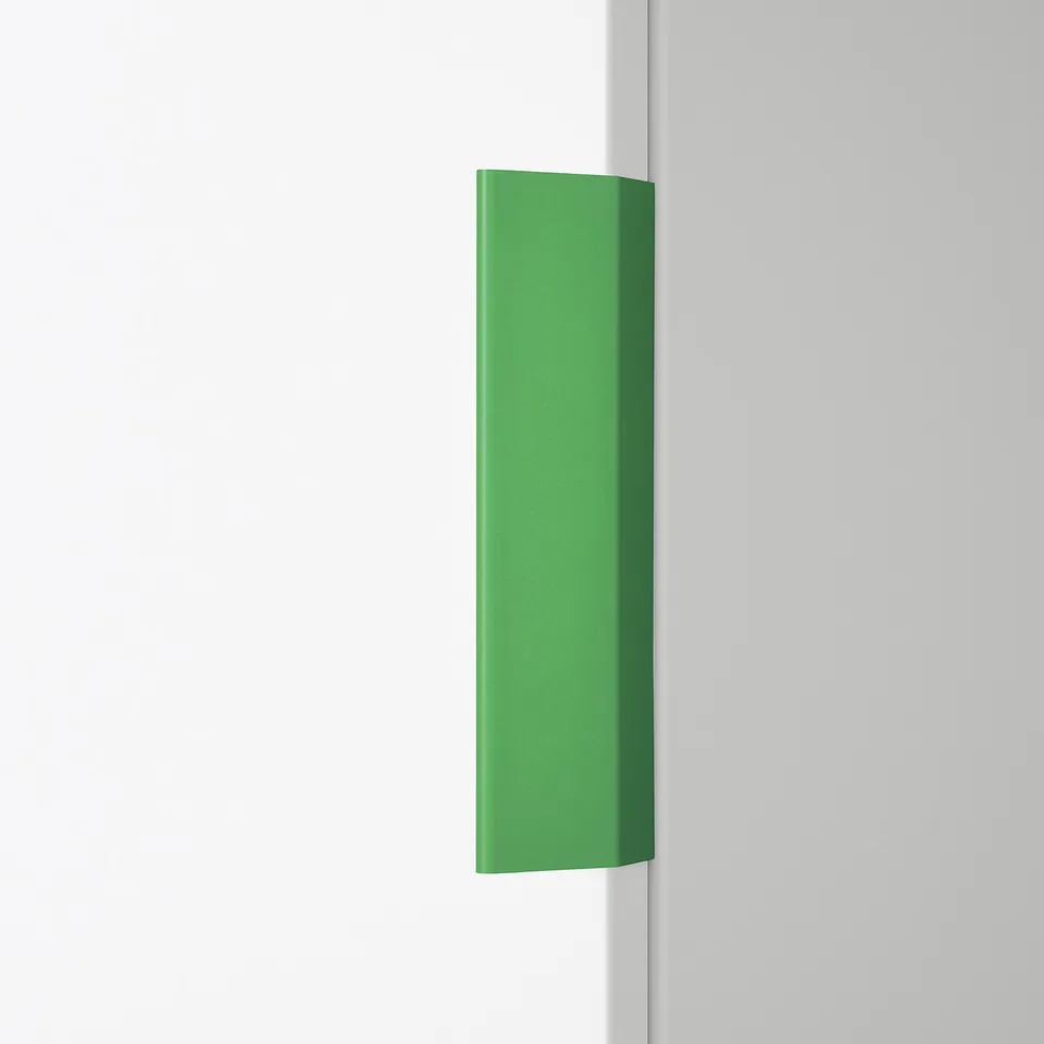 Green LÄTTHET handle, slim, minimalist, attaches anywhere; shown large, covers 1/3 wall height.