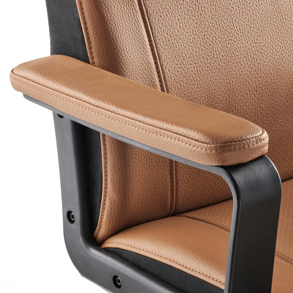 Close-up of MILLBERGET office chairs padded armrest & back, showcasing high-quality, breathable fabric & sturdy design.