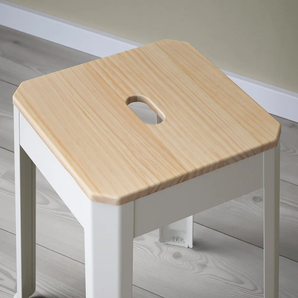 A stylish, sturdy stool with a wooden seat and metal legs, perfect for extra seating.