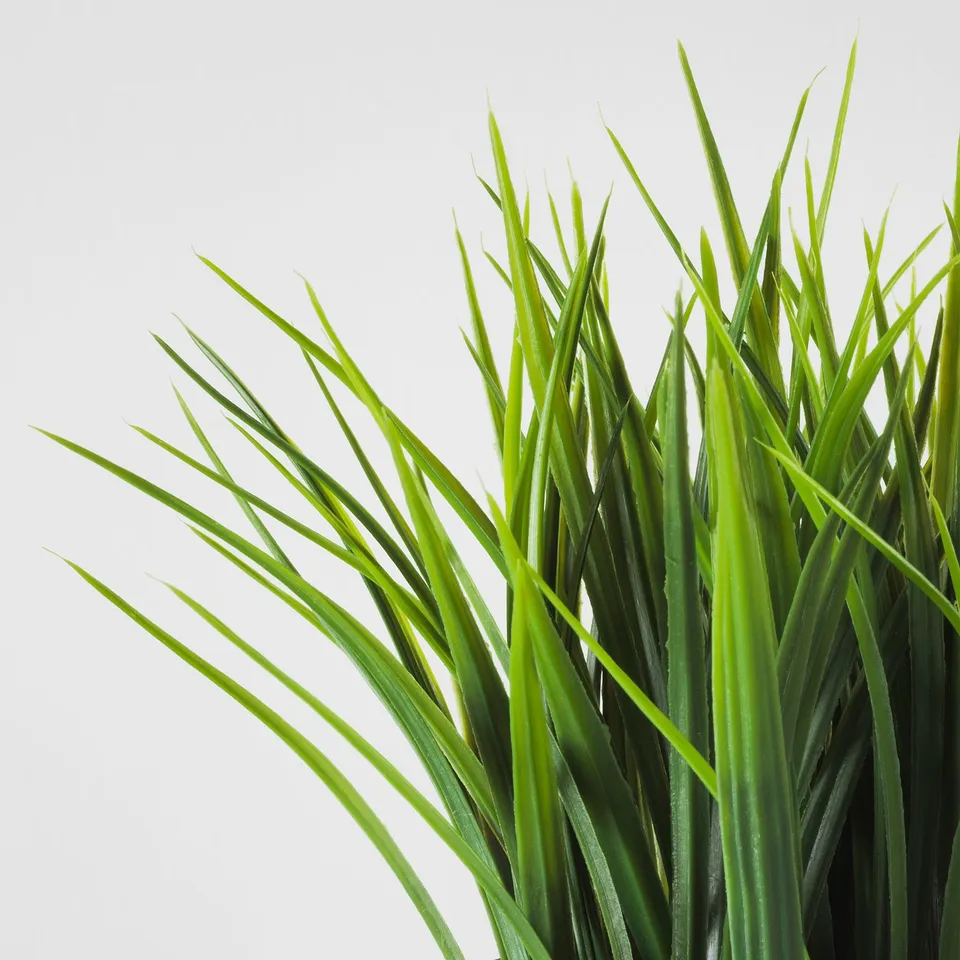 High-quality artificial greenery, vivid green leaves, realistic texture.