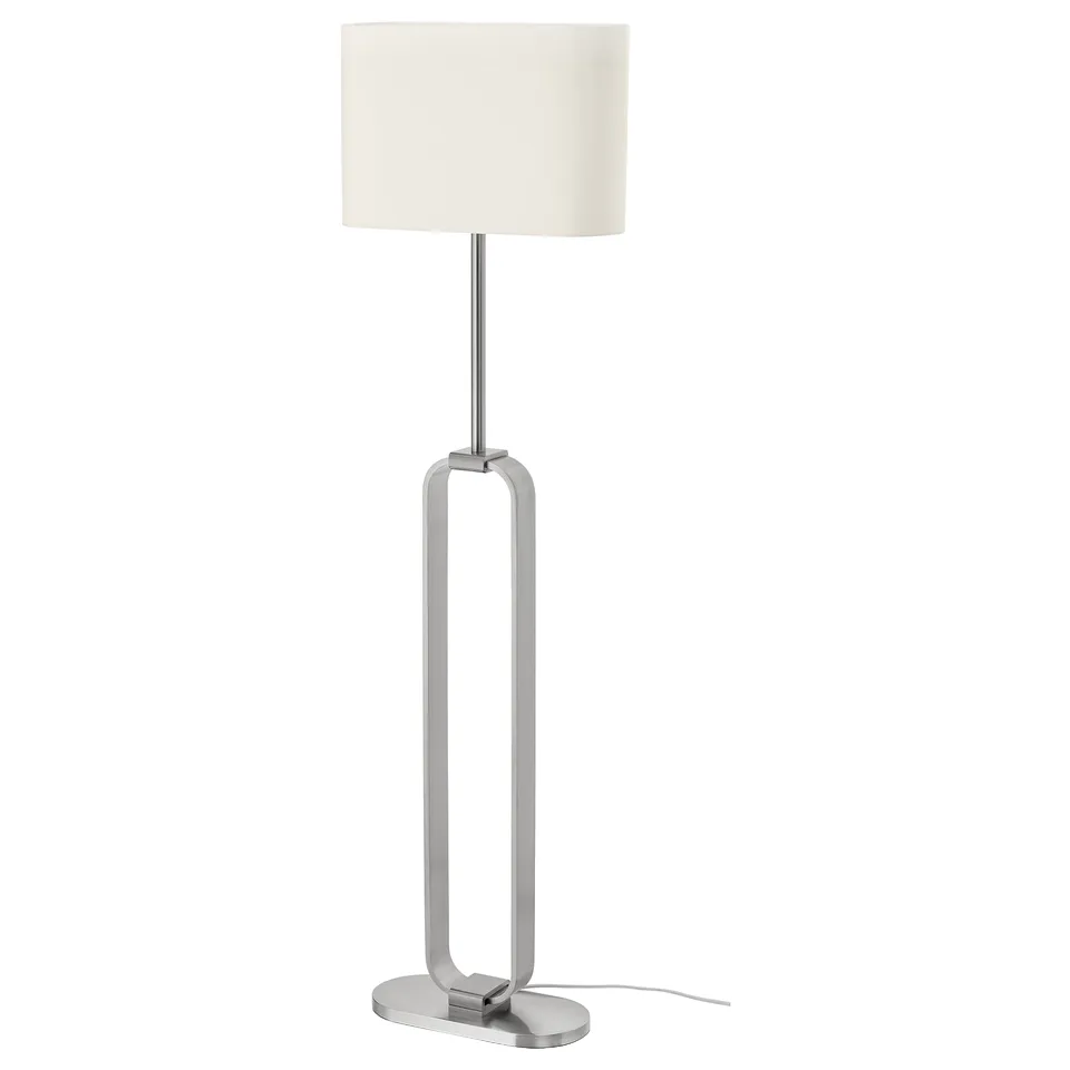 UPPVIND silver floor lamp with tuning fork base and soft shade.