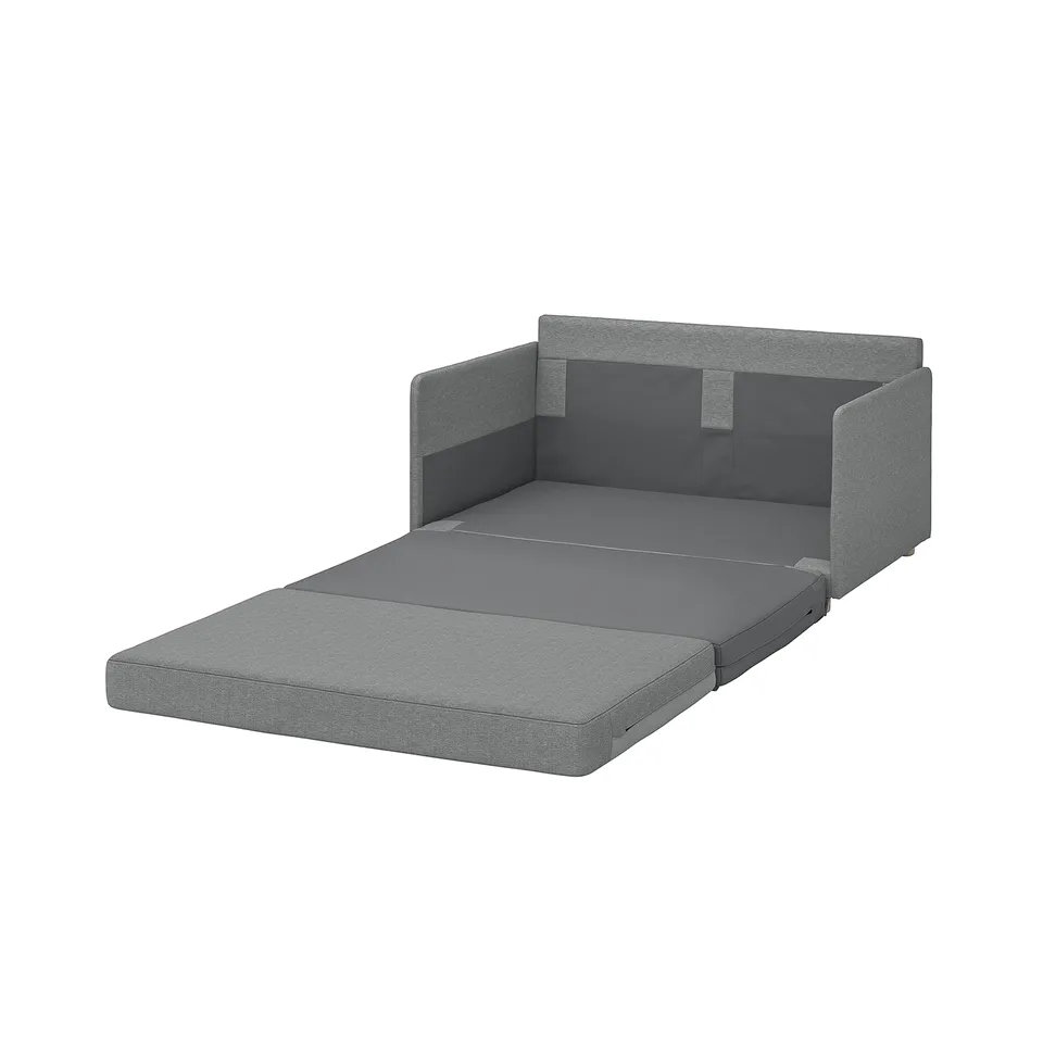 Grey FRIDHULT sofa bed, modern and compact for small spaces, converts easily.
