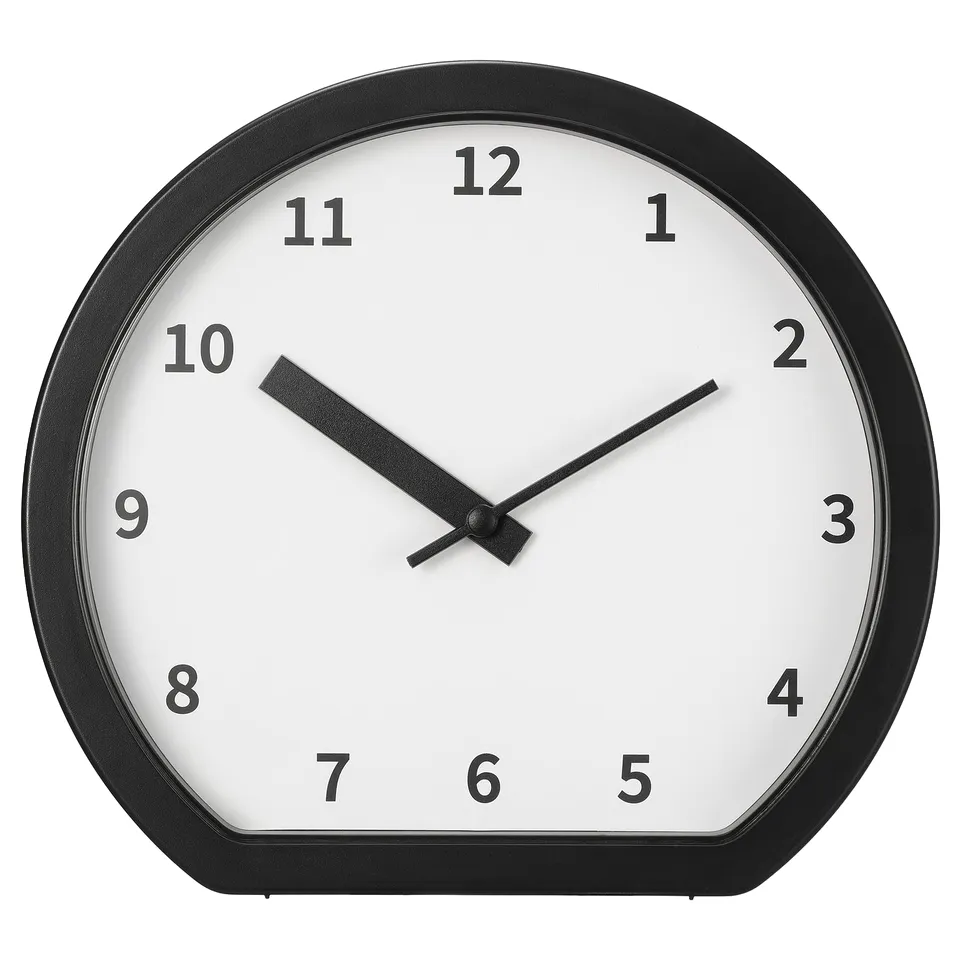 Black modern round clock with white face and black hands, displaying time as 10:10. Made from recycled abs plastic.