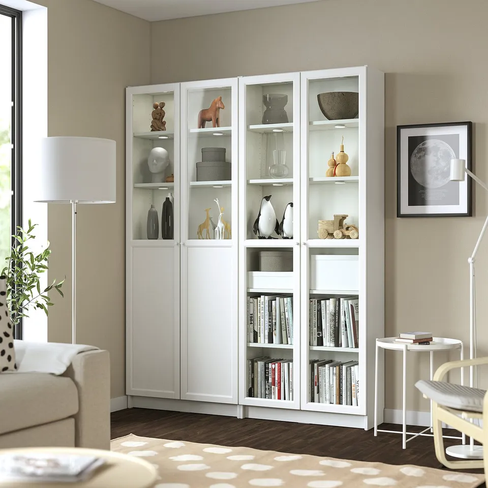 BILLY bookcase in living room with books, decor, and plants.