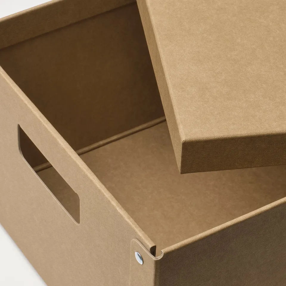 Open cardboard box showing sturdy handles and smooth interior.
