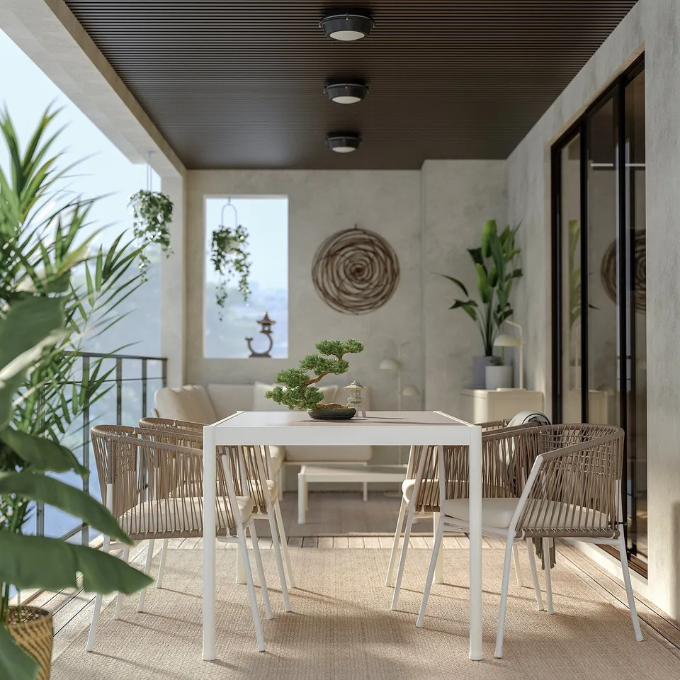 Modern outdoor dining set with white table and wicker chairs. Ideal for balcony or patio, a clean, minimalist design with a central parasol hole.