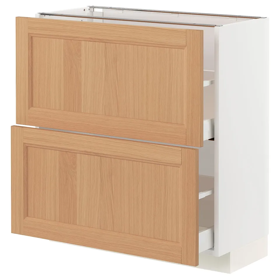 A light wood-colored METOD kitchen cabinet with two drawers and two doors in a rectangular design.