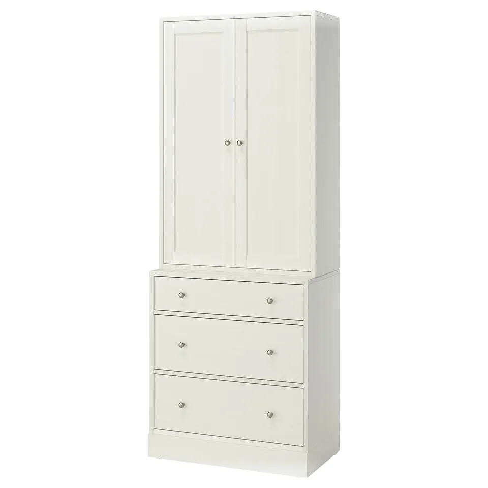 A white HAVSTA cabinet with three drawers, made of solid pine and fiberboard, featuring clean lines and scandinavian design.