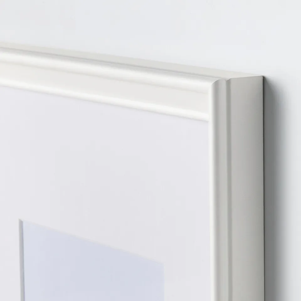 Close-up of sleek, modern picture frame, featuring thin edge and smooth finish.