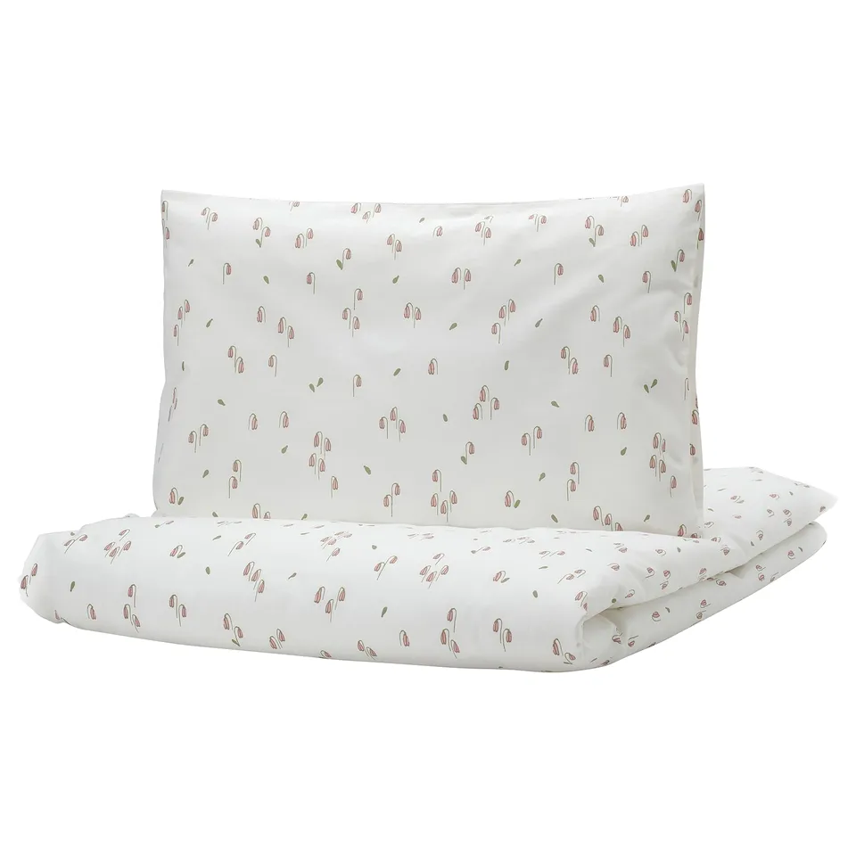 Organic cotton baby bedding set, white with pink flowers, zip closure.