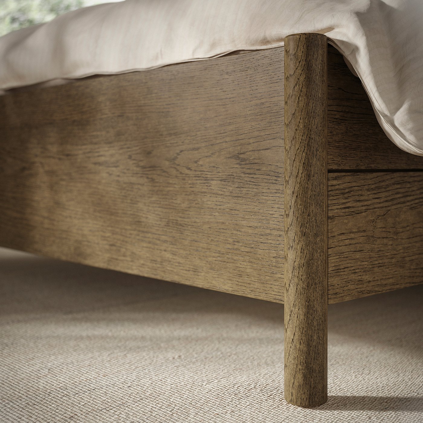 A close-up of a light wood bed frame with smooth grain and sturdy design.