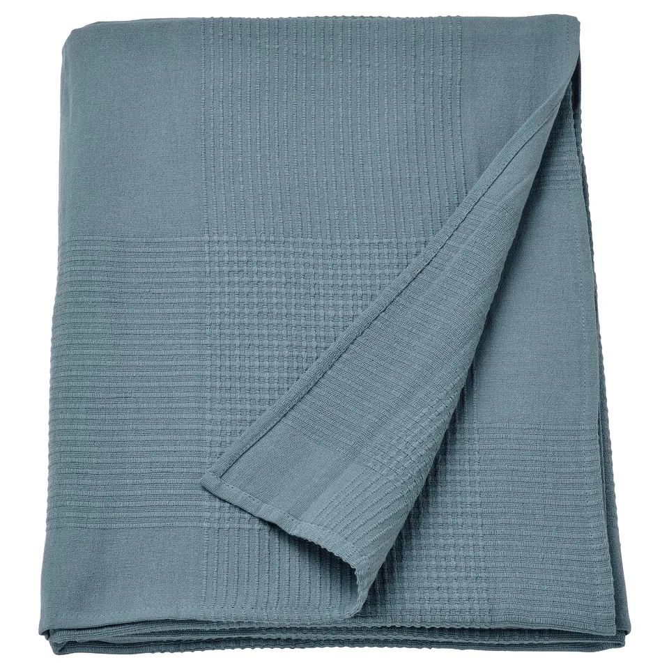 Blue cotton INDIRA bedspread, textured, folded, for double beds.