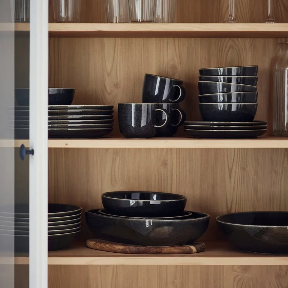 GLADELIG bowl, dark grey, stoneware. Round, craft-style, fits well on shelves.