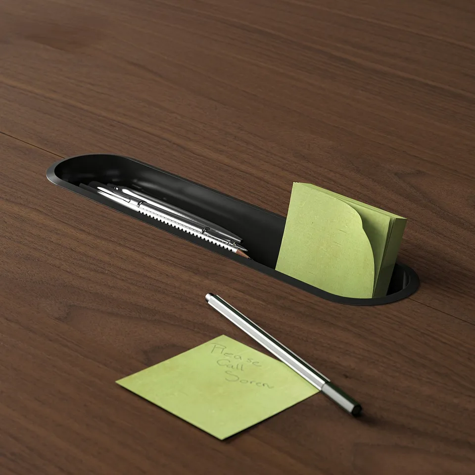 Wooden conference table with a built-in pen tray and post-it notes, emphasising organisation and accessibility for meetings.