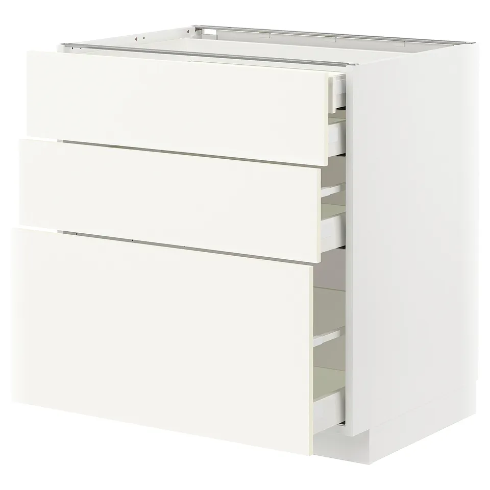 METOD white kitchen cabinet with multiple drawers, sleek modern design.