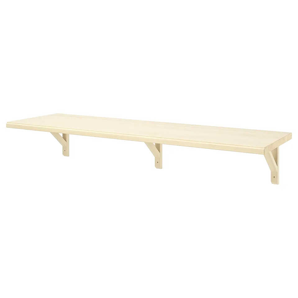 TRANHULT light wooden wall shelf with angled brackets.