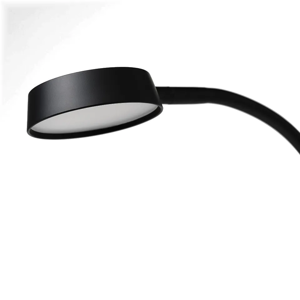 Modern black lamp with curved neck, emitting soft light, mounted on a smooth surface.