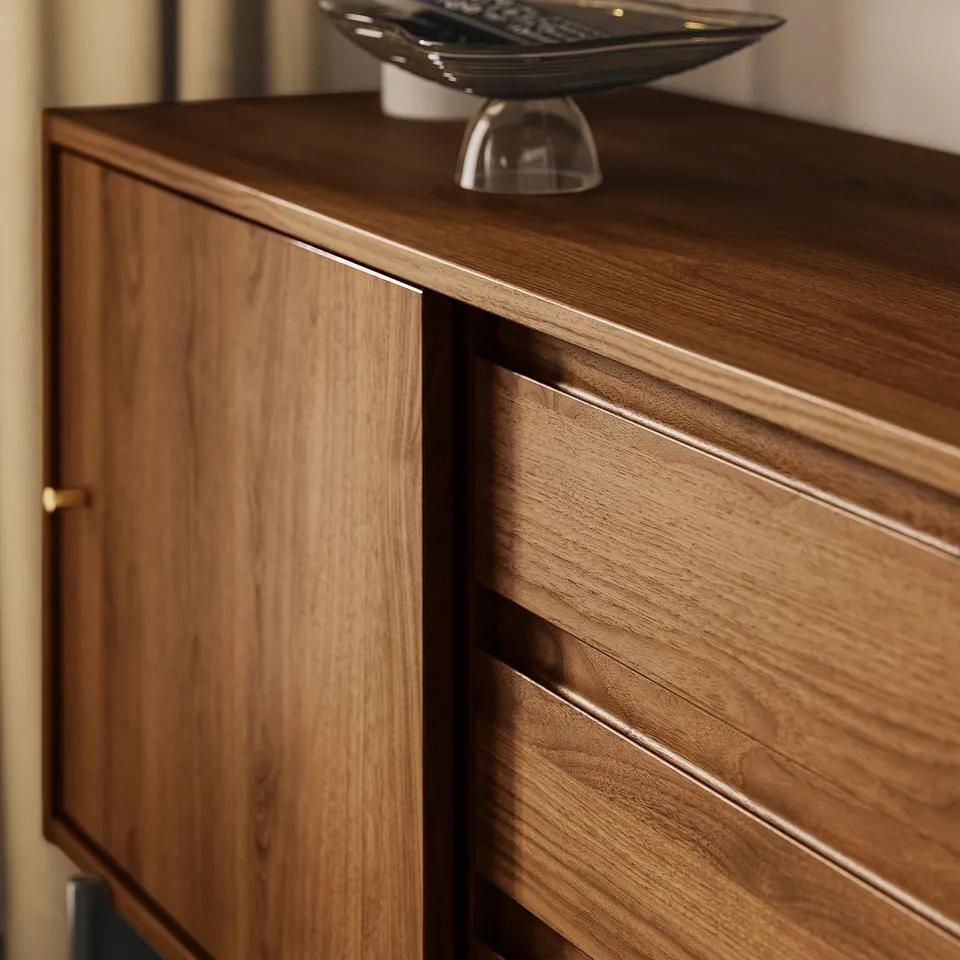 Modern wooden tv stand, rich walnut finish, gold handles, deep blue interior.