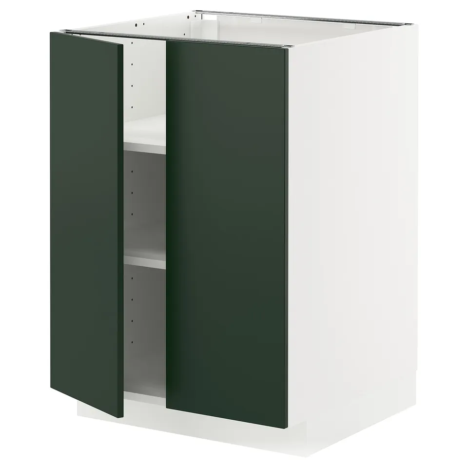 A white and green kitchen cabinet from the METOD system. It two green doors and a white frame with adjustable shelves.