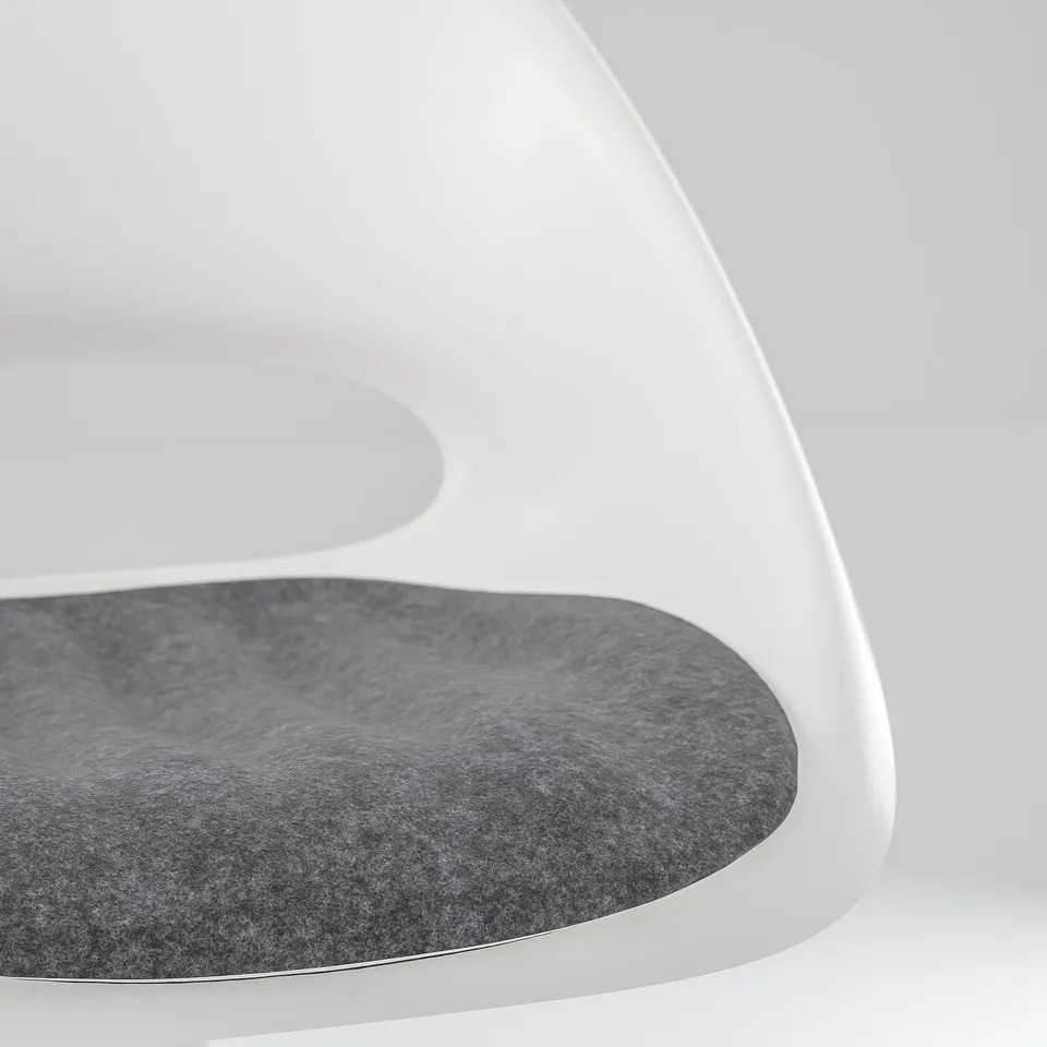 Close-up of a modern chair seat cushion with sleek design and soft texture.