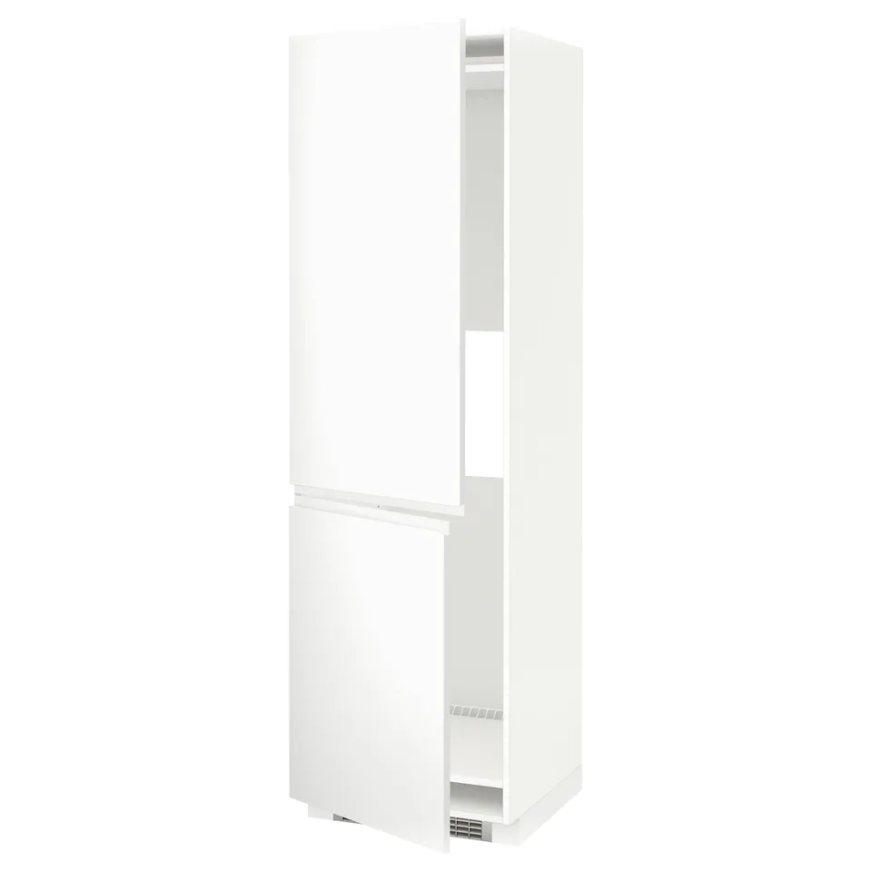 A white METOD kitchen cabinet with minimalist design and integrated handles.