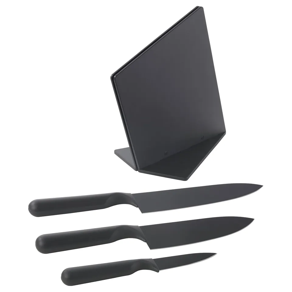 Black 3-piece knife set with stand. Ceramic blades, rubber handles. Chef, utility, paring knives.