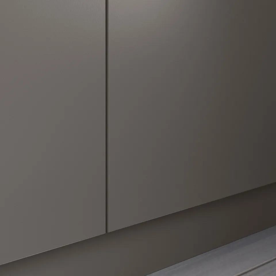 Close-up of PAX wardrobe showcasing smooth, matte-grey finish and sleek design with precise craftsmanship.