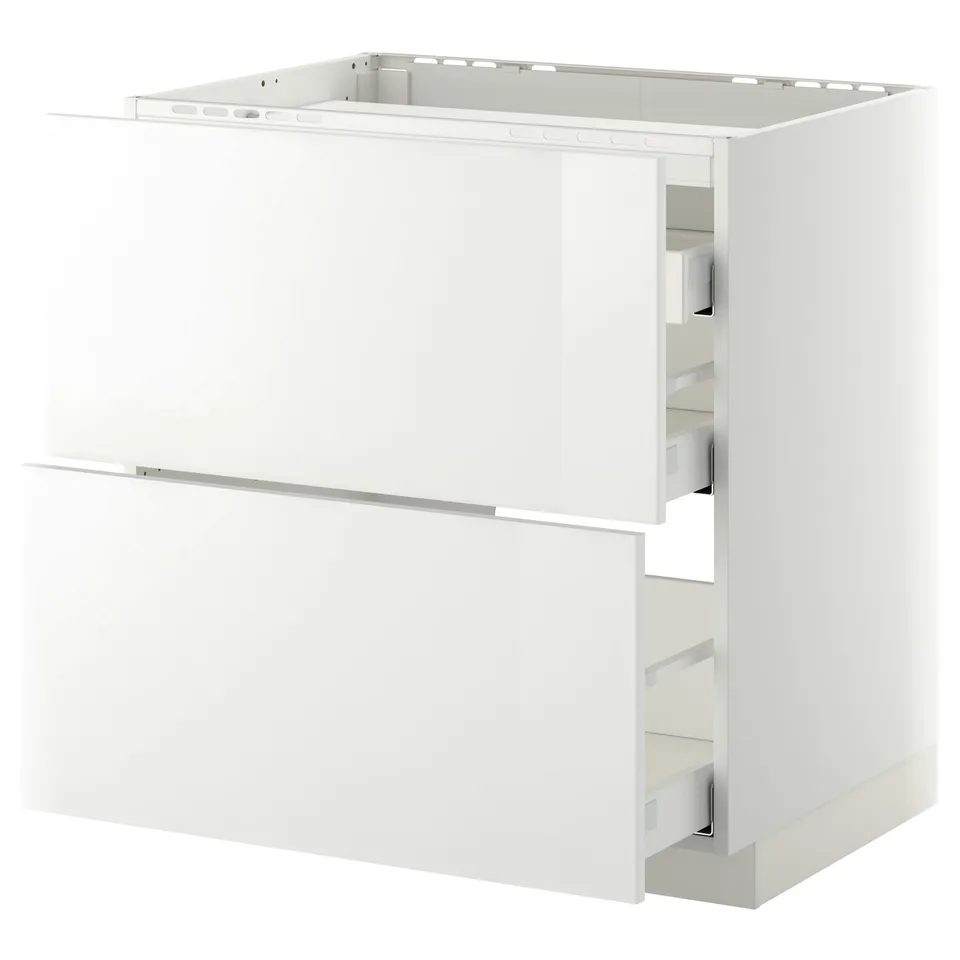 White METOD kitchen cabinet set with high-gloss fronts and base drawers.