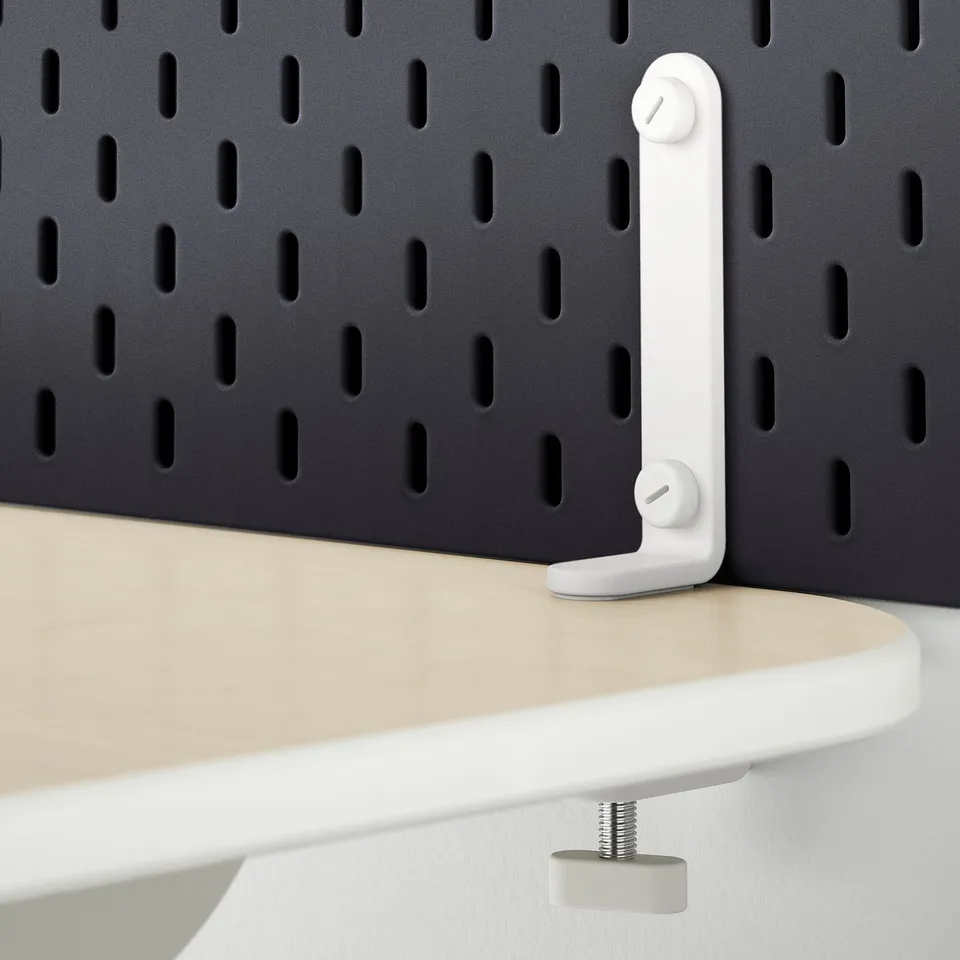 SKÅDIS pegboard hook holding white shelf.