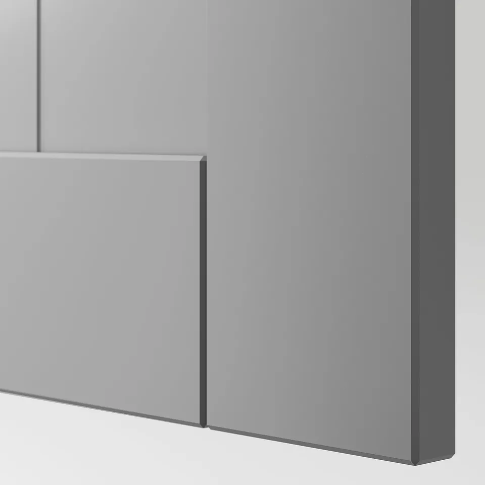 Close-up of a sleek, modern wardrobe door with a smooth, reflective surface and clean lines.
