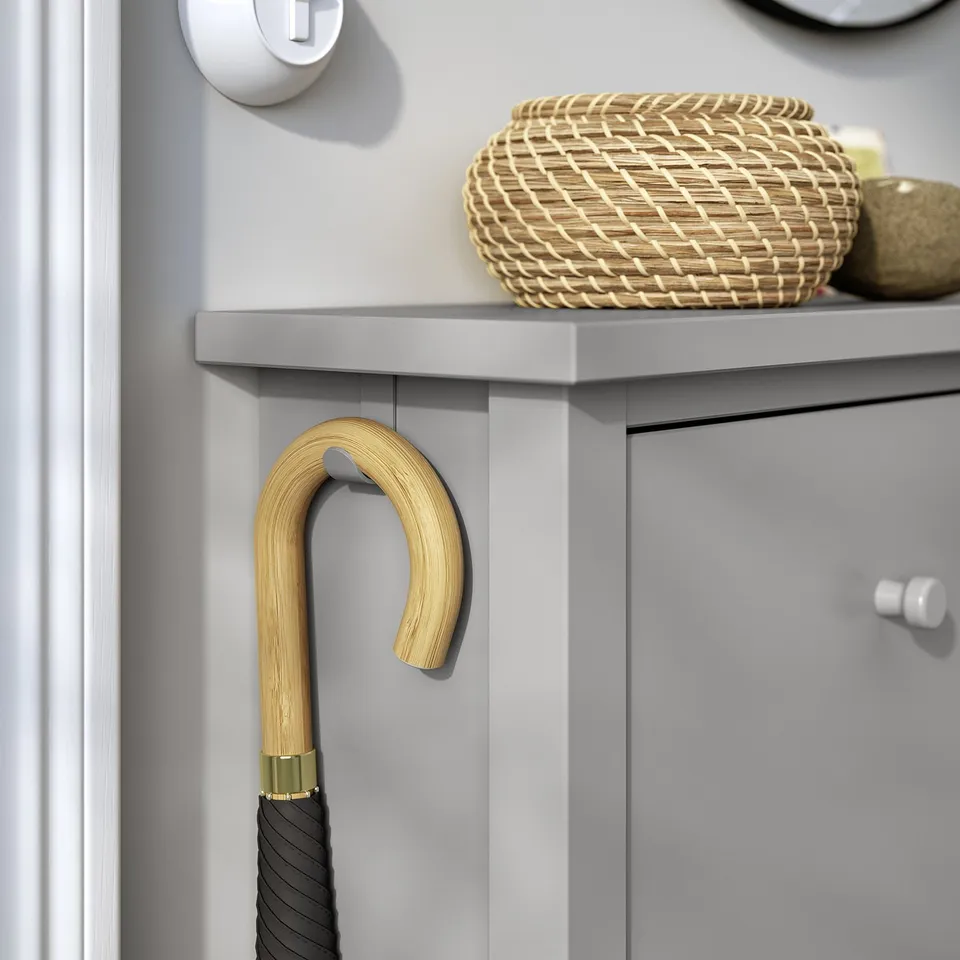 Narrow grey wooden shoe cabinet with 4 compartments, single hook each side, shallow design.