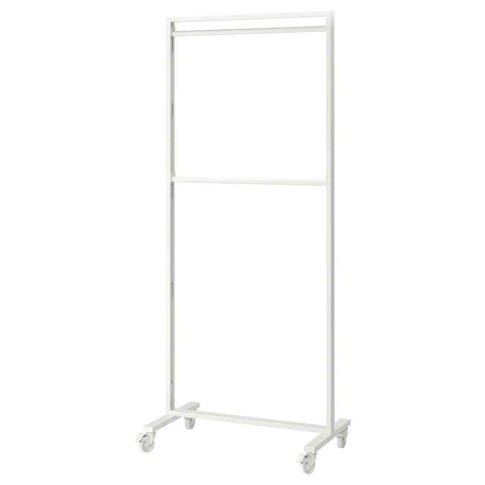 A MITTZON white metal frame with wheels for dividing spaces, ideal for hanging coats.