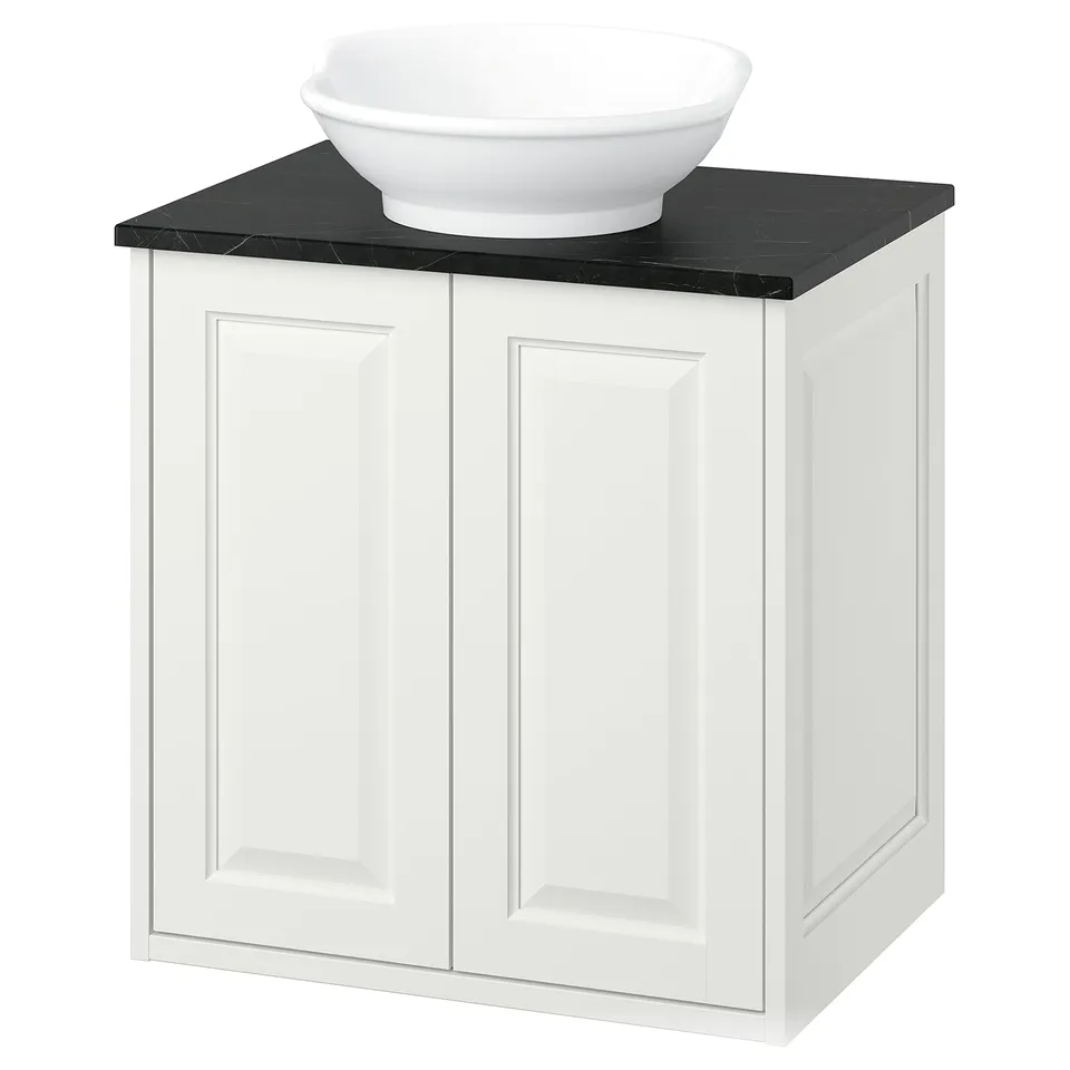 White TÄNNFORSEN vanity, classic design. Black marble countertop, round basin.