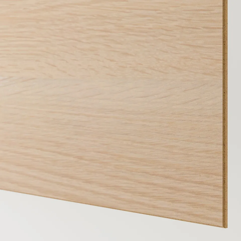 Smooth, light wood panel detail. Shows fine grain texture and clean finish.