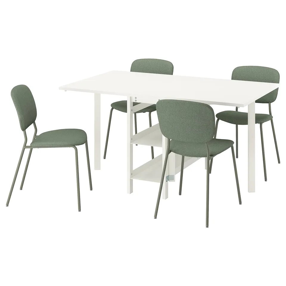 A VIHALS dining set with a white table and four green chairs. Its minimalist and modern, featuring padded seats, metal legs, and amelamine tabletop.