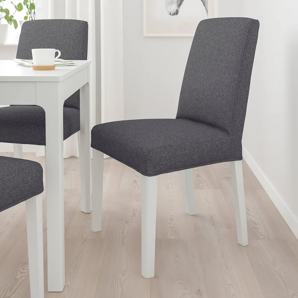 Modern dining chair, BERGMUND, grey fabric, white legs, curved back, comfortable seat, fits under table.