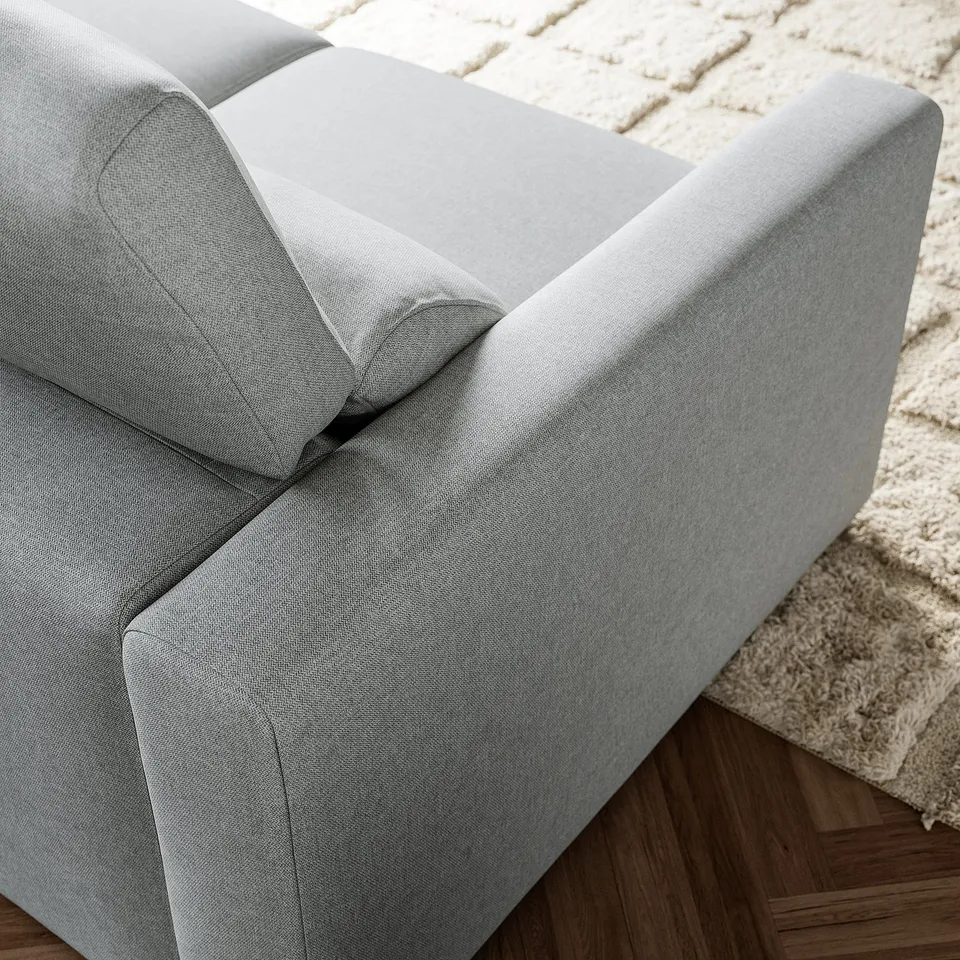 Modern sofa with clean lines, soft cushions, water-repellent fabric, and adjustable headrests. Ideal for comfort and relaxation.