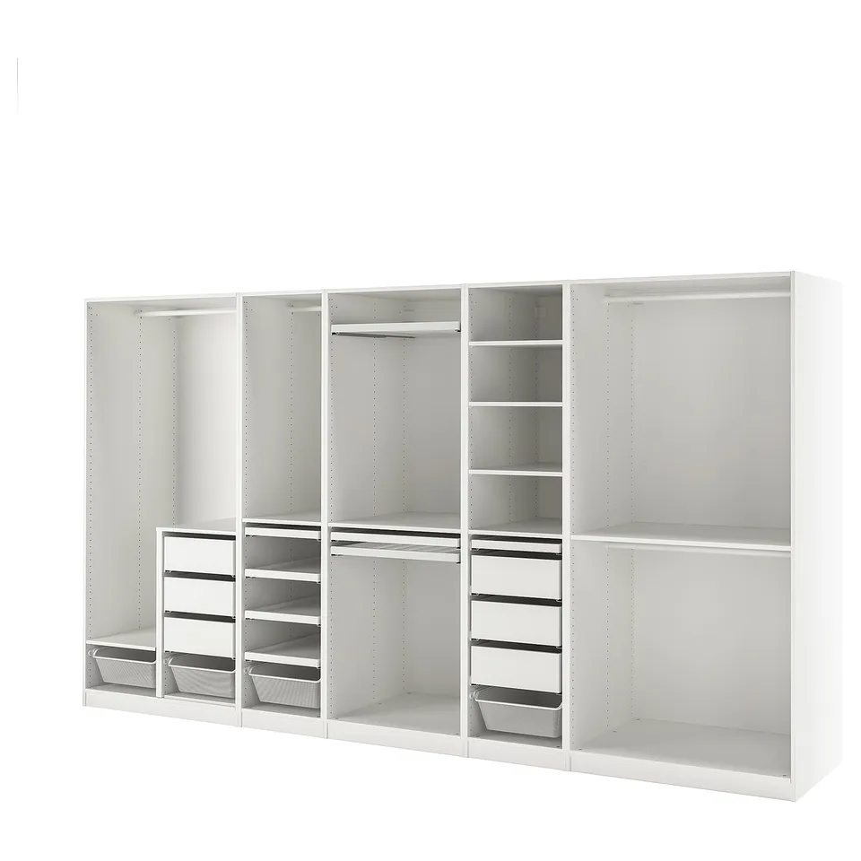 White PAX wardrobe system with shelves, drawers, and hanging space.