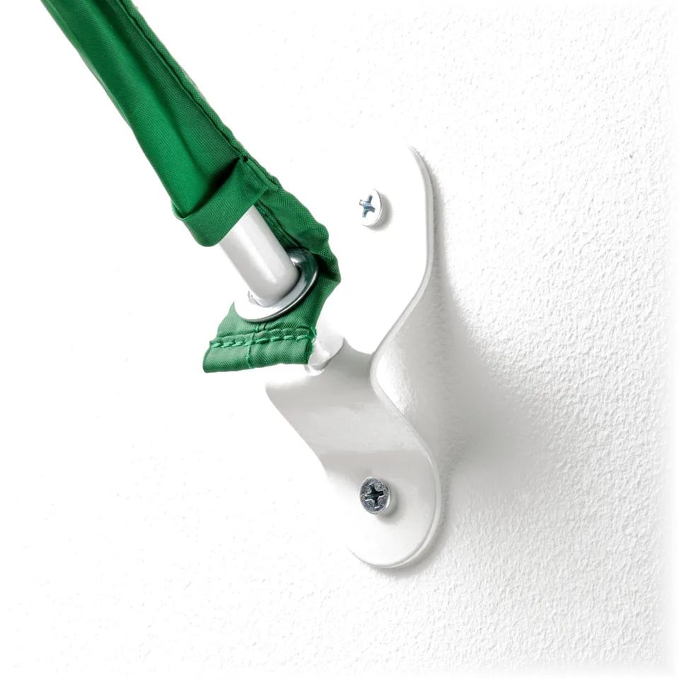 Wall-mounted green bed canopy, securely fastened with white plastic clips and screws, ensuring stability and quality.