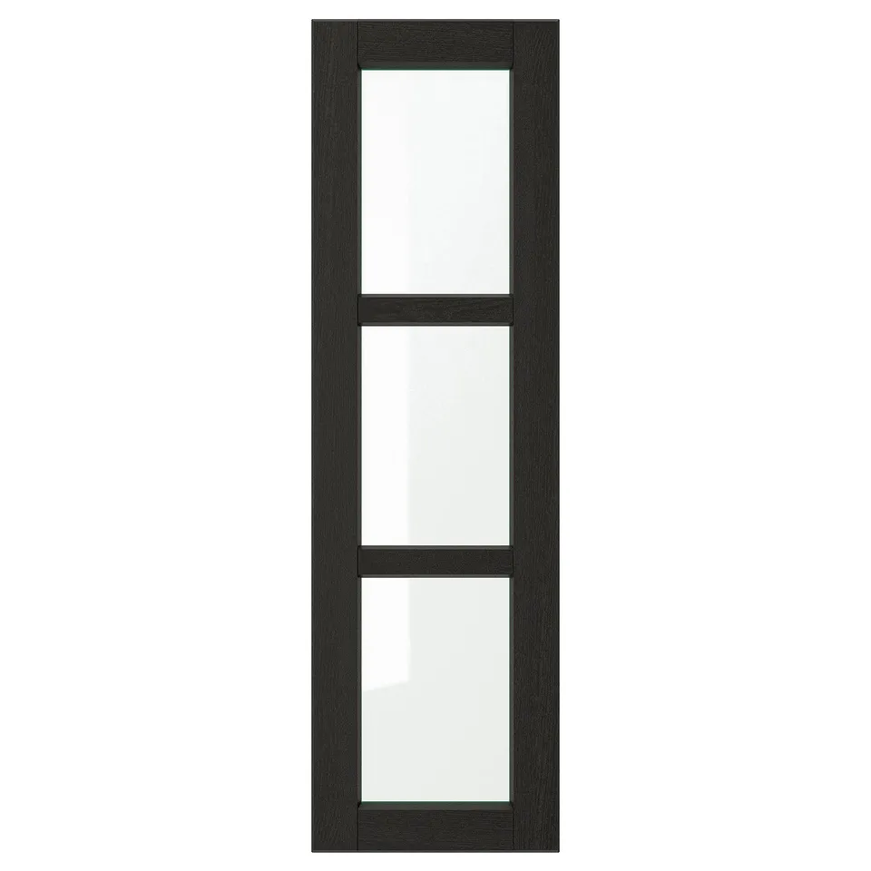 A LERHYTTAN black kitchen cabinet door with a wooden frame, bevelled edges, and glass panels.