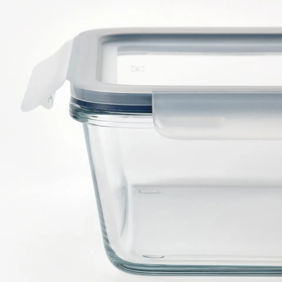 Clear glass food container with snap-lock lid, showing quality design for airtight storage.