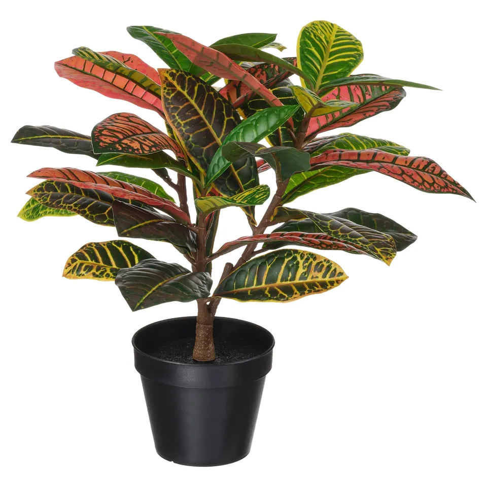 FEJKA artificial plant, colourful green and orange leaves, potted in black container, indoor plant.