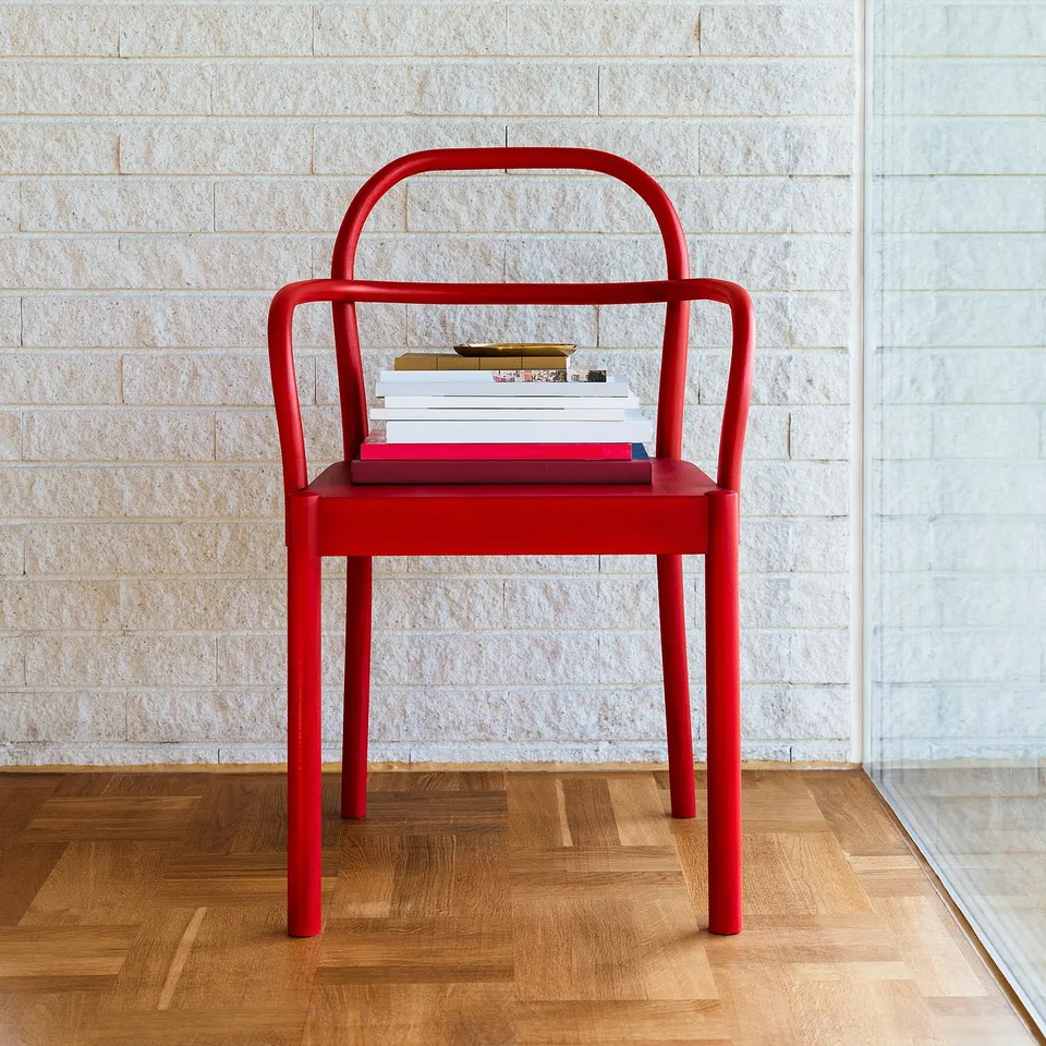 Red STOCKHOLM 2025 chair, compact & functional scandinavian design.