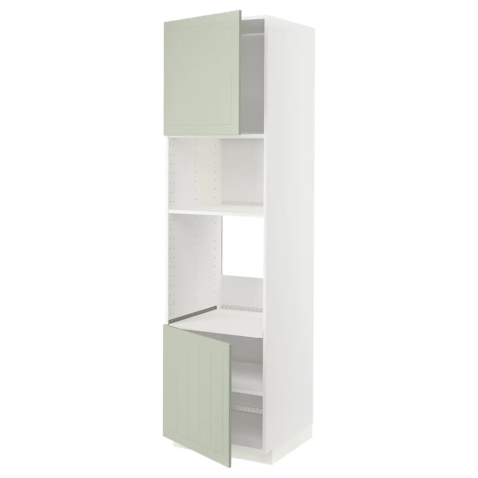 A tall, slim METOD kitchen cabinet in white with green stensund doors, featuring an adjustable shelf and a 25-year guarantee.