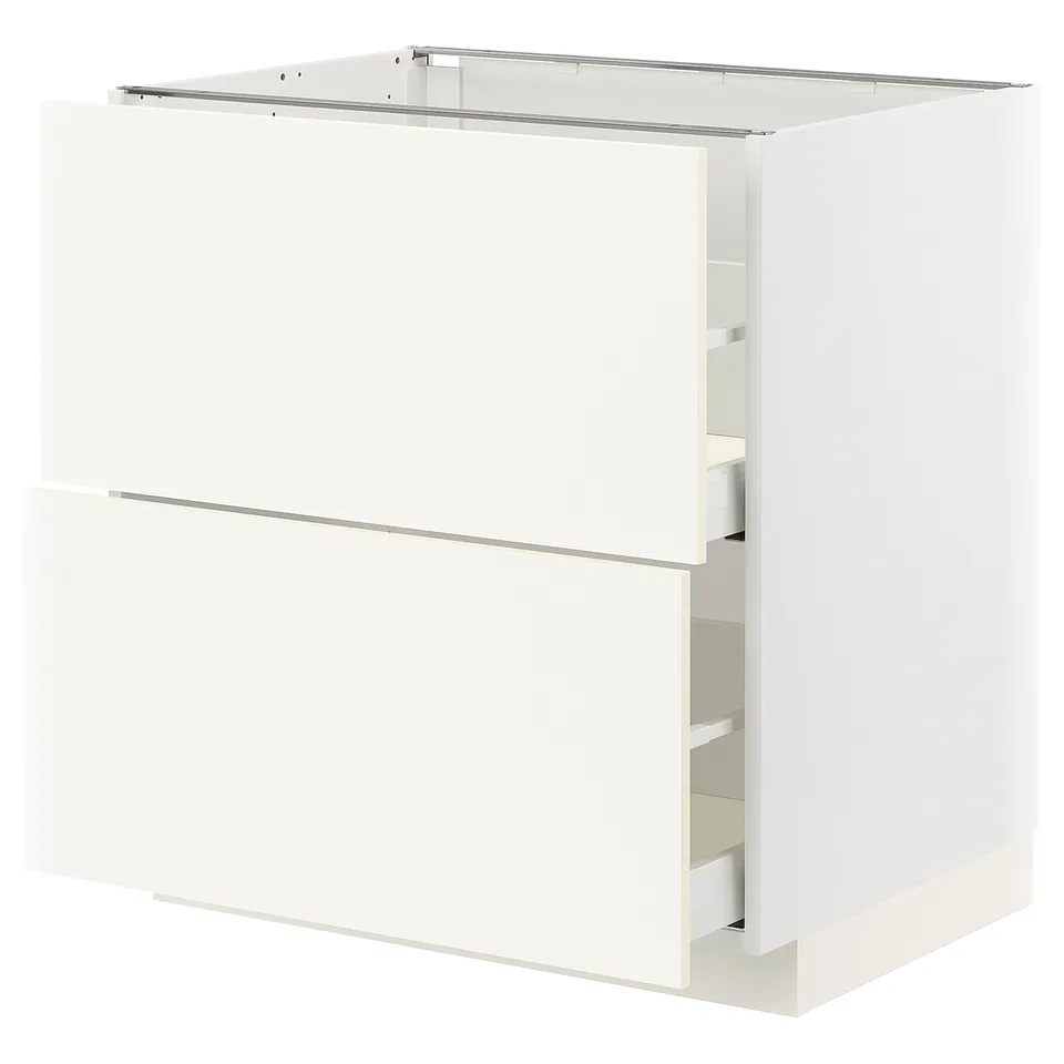 A white METOD kitchen cabinet unit with smooth-running drawers.